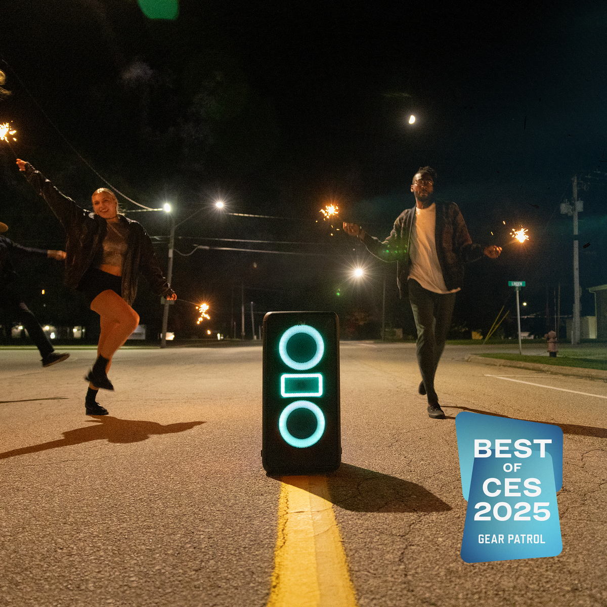 Klipsch Klipsch Miami NA Black (Led Accents) Klipsch Miami Party Speaker in middle of empty street at night with friends dancing around with sparklers with Gear Patrol Best of CES 2025 badge 2000x2000