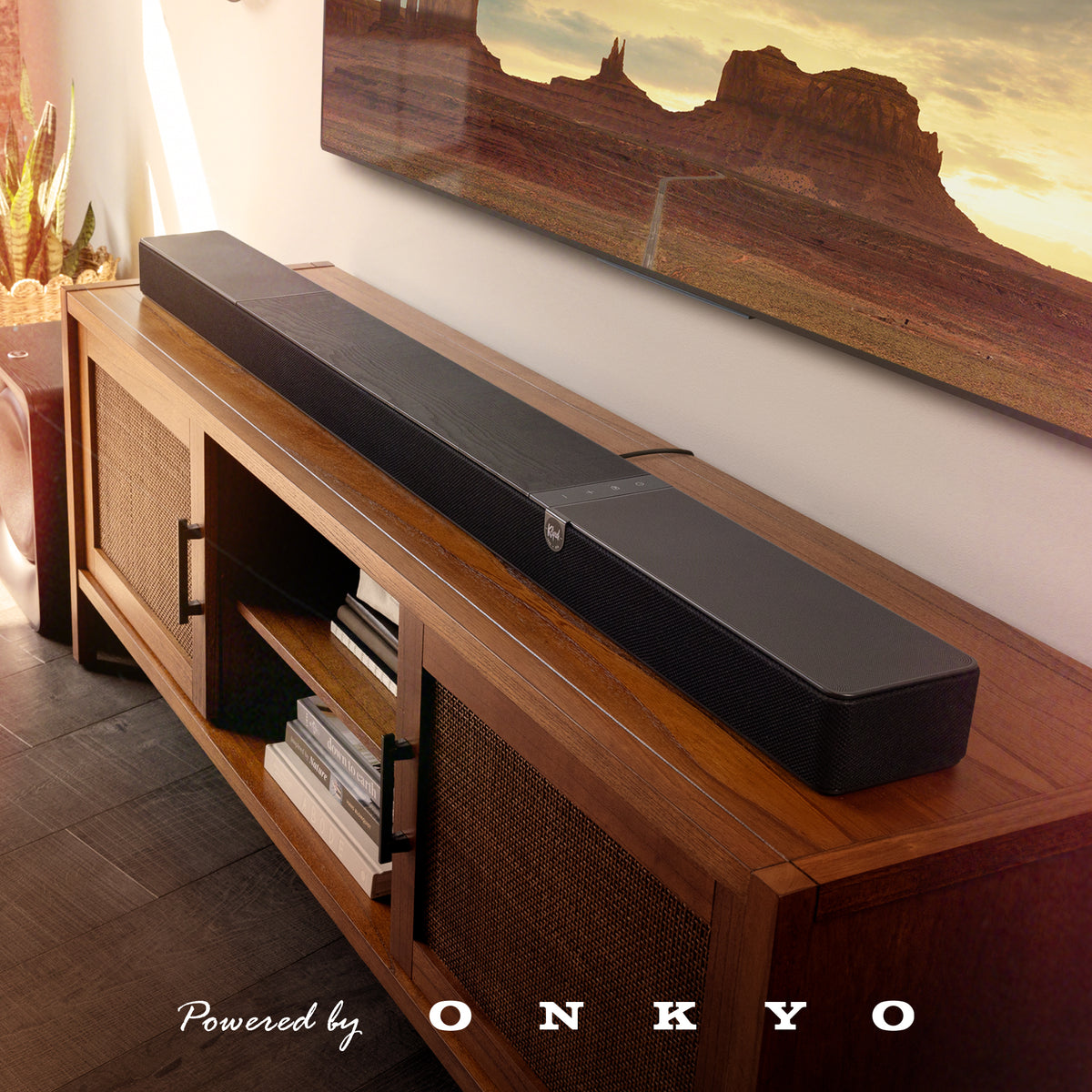Klipsch Flexus Core 300 Soundbar NA Black Flexus CORE 300 BK on media console with beautiful southwestern American landscape on tv