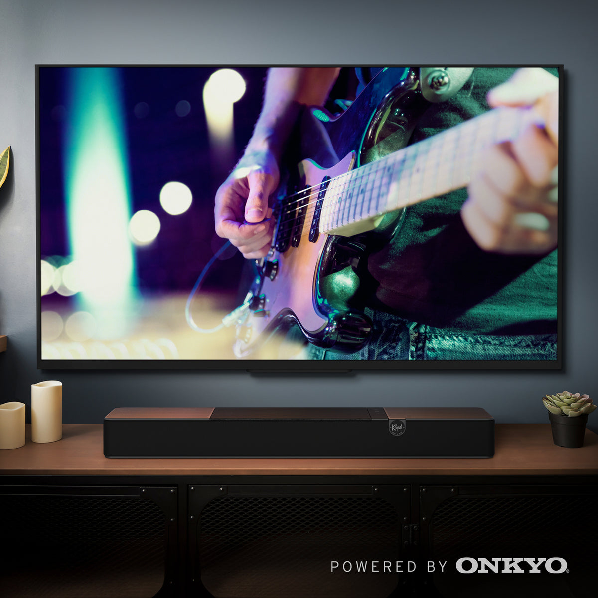 Klipsch Flexus Core 100 Soundbar NA Black Klipsch Flexus Core 100 Under TV Playing Rock Concert 2000x2000 logo v02